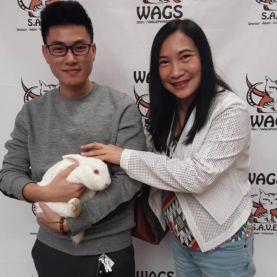 mother and son adopt a bunny at WAGS