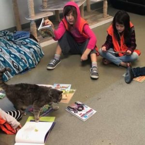 kids reading volunteer at WAGS