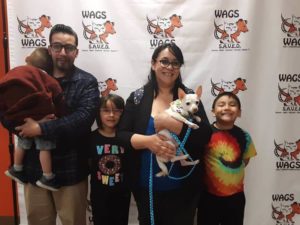 lovely family happy adopt a dog WAGS