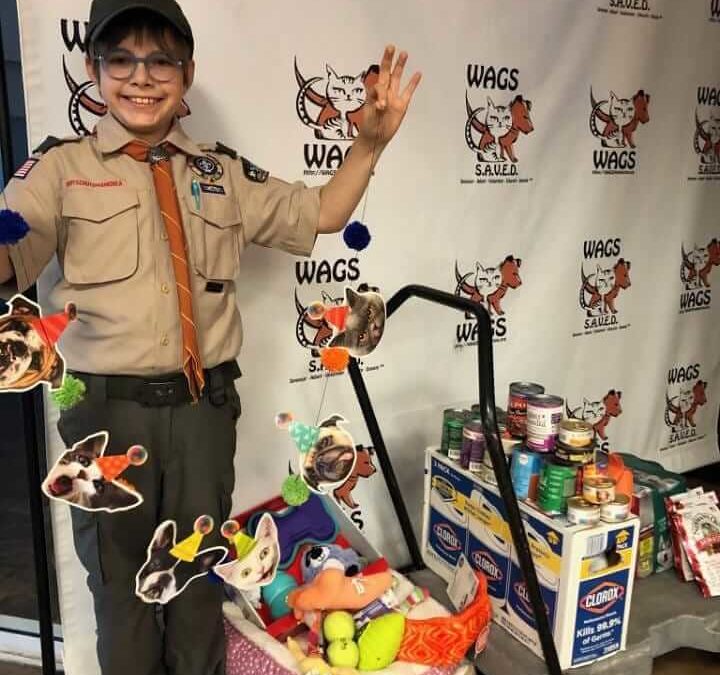 A young man from Boy Scout pack 227 had a birthday party and chose WAGS
