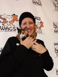 young lady adopt a kitten at wags