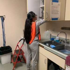volunteer for wags cleaning up the cabinets