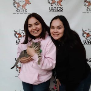 sisters women in pink and black adopted mila cat WAGS
