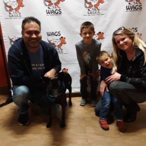 new black dog for family withtwo sons